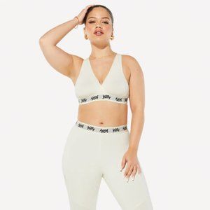 Yiity Sports Bra "Major Label Smoothing Cross-Front Bralette" in Ivory